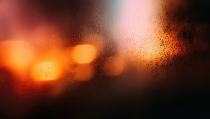 Abstract night scene through a misty window. Blurred city lights