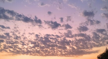 Evening orange sky with clouds wallpaper
