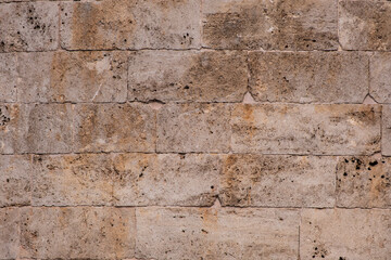 Textured stone wall surface background - Natural stone wall surface