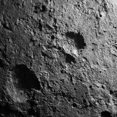 Close-up view of a rocky, cratered surface