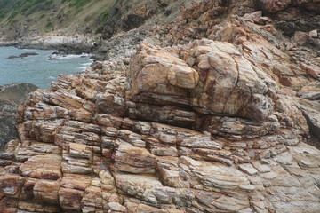 Huge heap with quartzite rock boulders at Khao Leam Ya - Mu Ko Samet National Park in Thailand.