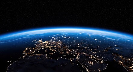 Earth at night from space showing city lights and atmosphere