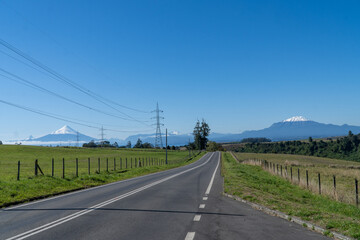 Empty Country Path with Volcanoes in Background – Puerto Varas, Chile