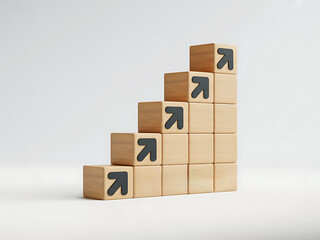 Obraz premium Wooden blocks stacked in a staircase shape with arrows and text