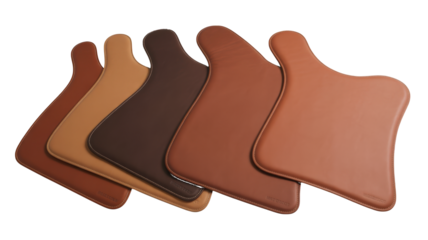 Leather desk mats in various earth tones isolated on a transparent background image