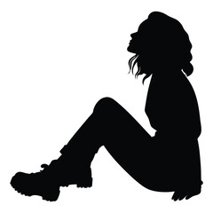 silhouette of a young woman with wavy hair wearing a black t-shirt combat boots