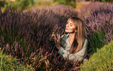 Woman Enjoying Serene Moment in Lavender Field