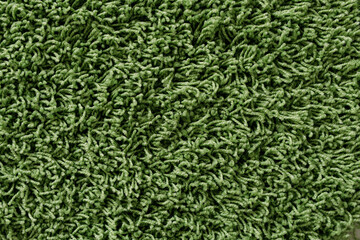 High-resolution image of green shag carpet texture. Perfect for backgrounds and design projects.