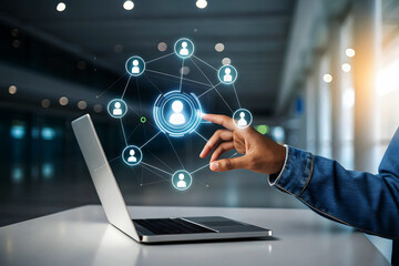 Hand interacting with glowing digital network of people icons