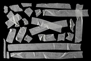  Set of various paper adhesive tape pieces isolated on black, clipping path