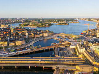 Slussen, vattentorget, Gamla Stan in Stockholm, aerial view, golden summer sunshine