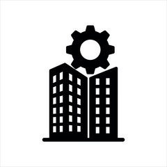 Black silhouette of two buildings with a gear on top against a white background architecture industry
