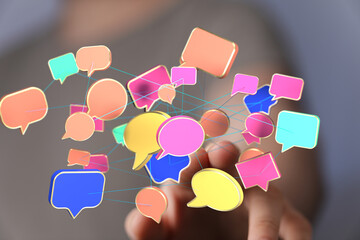 Abstract image of interconnected speech bubbles, representing communication, networking, and social...