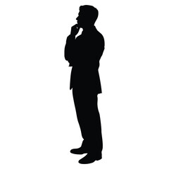 Silhouette of a businessman deep in thought with hand on chin