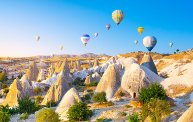 Sunrise view of unusual rocky landscape in Cappadocia, Turkey