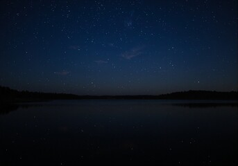 Fototapeta premium Night sky reflected in lake