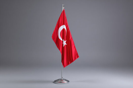 15temmuz for powerful colours signs editable pride vote occasion concept. Turkish flag on silver pole with gray background, symbol of national pride and patriotism