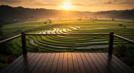 Sunrise over terraced rice paddies from a wooden balcony