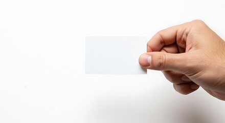 Obraz premium Hand Holding a Blank Card on White Background