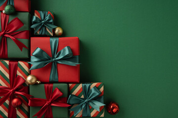 A festive arrangement of Christmas presents with red and green bows next to ornaments