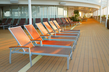 Reclining Deck Chairs on the Deck of a Cruise Ship for Relaxation