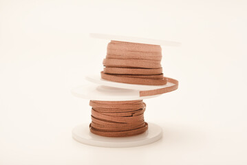 Copper braid for cleaning printed circuit boards from solder. Copper coils with braid. A tool for removing solder from printed circuit boards.