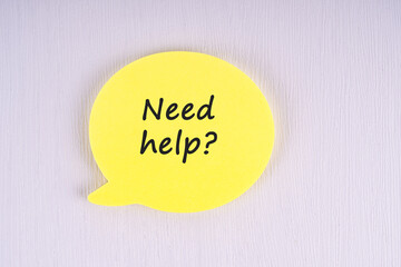 Need Help? sign on sticky paper note white background