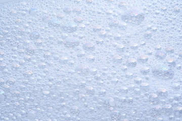 Soap foam with bubbles. The texture of the cleansing product.