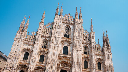 Fototapeta premium Milan Cathedral spires against the blue sky