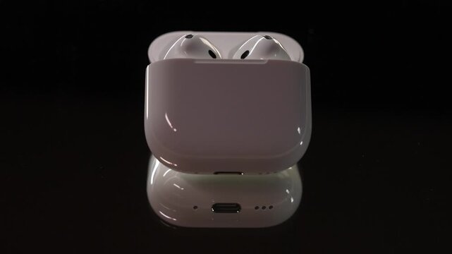 white headphones with a case