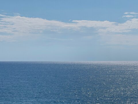 Blue sparkling ocean and sky.