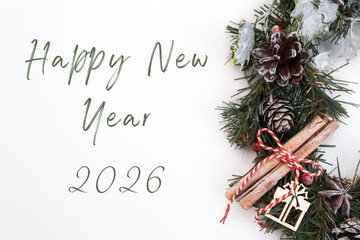 Festive holiday wreath with pinecones, cinnamon sticks, and cheerful New Year greeting for 2026