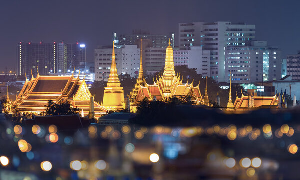 Top view of The Grand Palace and The Emerald Buddha Temple at night time.
