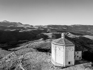 Italy, July 5, 2025: Ruins of Rocca Calascio Castle, an Italian tourist destination and landmark in the Gran Sasso National Park, L'Aquila, Abruzzo. Clear blue skies at sunset.
