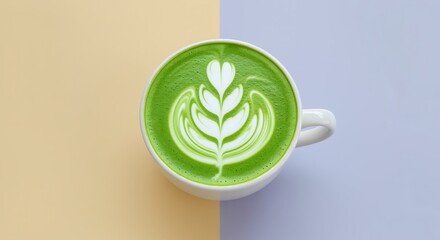 Vibrant green matcha latte with delicate latte art in a white mug, a perfect morning beverage experience
