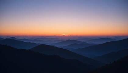 Distant Ridge Silhouette at Sunset: Layers of Blue and Purple Mountains