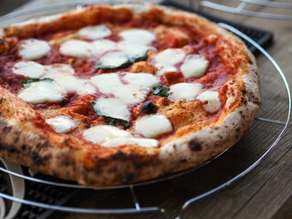 Authentic Margherita Pizza Fresh from the Oven – Crispy Crust, Melted Mozzarella, and Basil Garnish