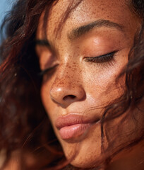 Portrait of beautiful natural black woman enjoying summer