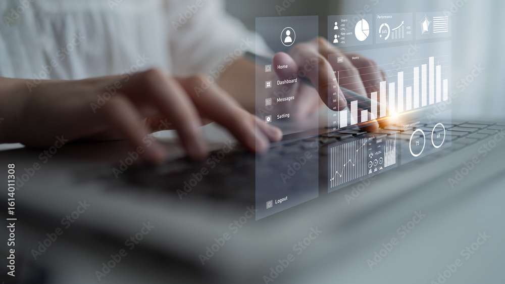 Poster close-up view of hands typing on a laptop with digital graphs and analytics on the screen, showcasin