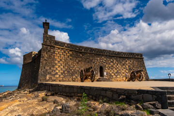 Stone castle with cannons on display at Arrecife, Lanzarote, Canary Islands. Historical fortress...