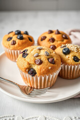 Assortment of Delicious Fruit and Chocolate Chip Muffins