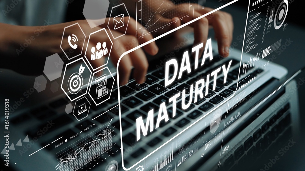 Poster hands typing on laptop with data maturity concept graphical elements and digital graphics overlay. a