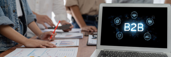 Business person navigates B2B landscape, harness technology to enhance business-to-business...