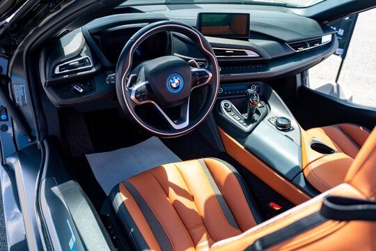 steering wheel of a car interior BMW i8 detail logo