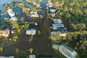 Naklejka premium Aftermath of natural disaster. Surrounded by hurricane rainfall flood waters homes in Florida residential area