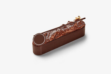 Chocolate dessert bar decorated with gold leaf and round chocolate piece