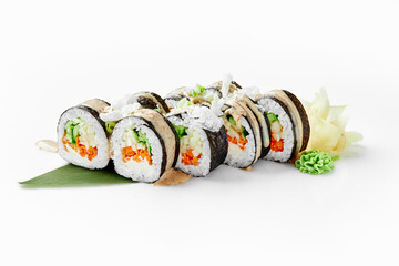 Delicious vegan sushi rolls with vegetables and sesame seeds on white background