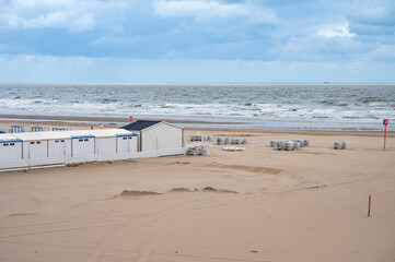White beach cabines at the seaside in Blankenberge, West Flanders Belgium