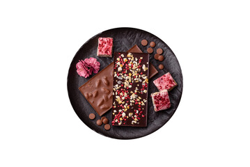 Bar sweet craft artisan chocolate with dried fruits made at home. Craft chocolate