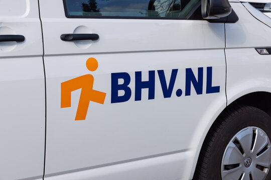 A close-up of the side of a van, and "BHV.NL" logo in blue. BHV stands for "company emergency response." They provide first aid in the event of accidents. Nieuwegein, Netherlands. 15 July 2025.